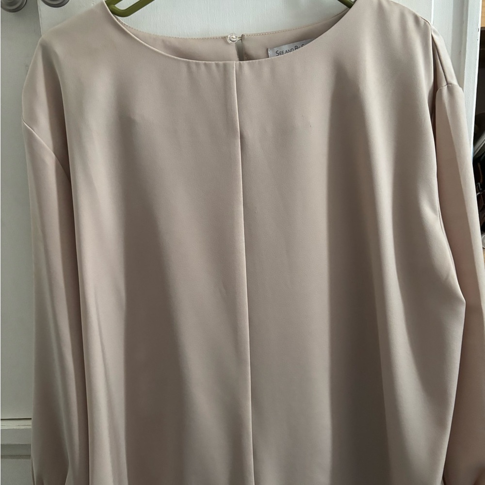 Cream Silky Flowing Garment with Elegant Pleats